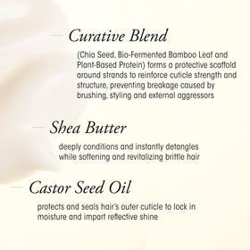 Oribe open jar swatch on hand showing thickness and easy spreadability