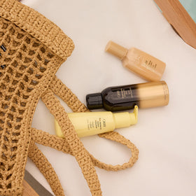 Oribe matte waves size comparison next to palm illustrating travel-friendly 3.38 fl oz benefit