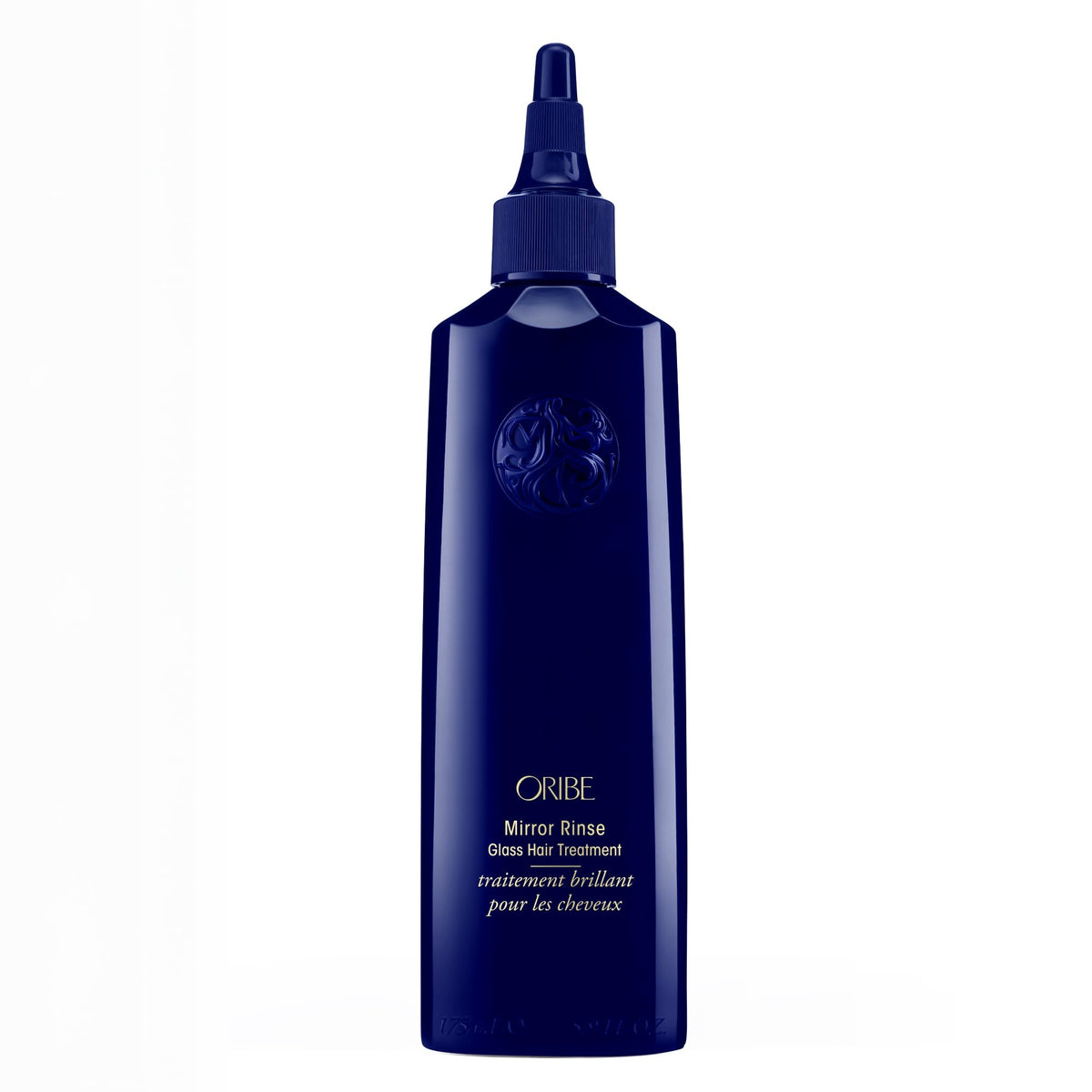 Oribe front bottle shot showing sleek packaging and brand luxury benefit