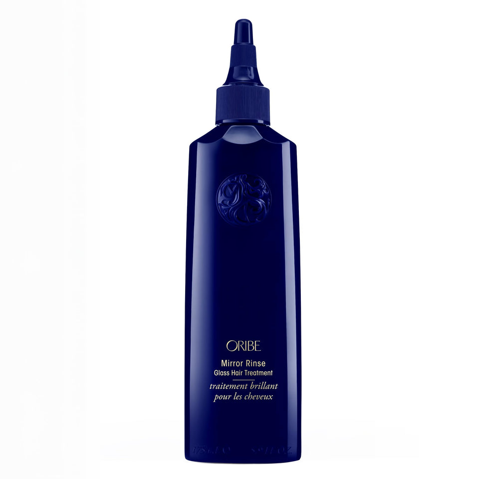 Oribe front bottle shot showing sleek packaging and brand luxury benefit
