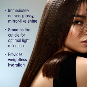 Oribe styled sleek hair lifestyle shot showing high-reflective mirror shine