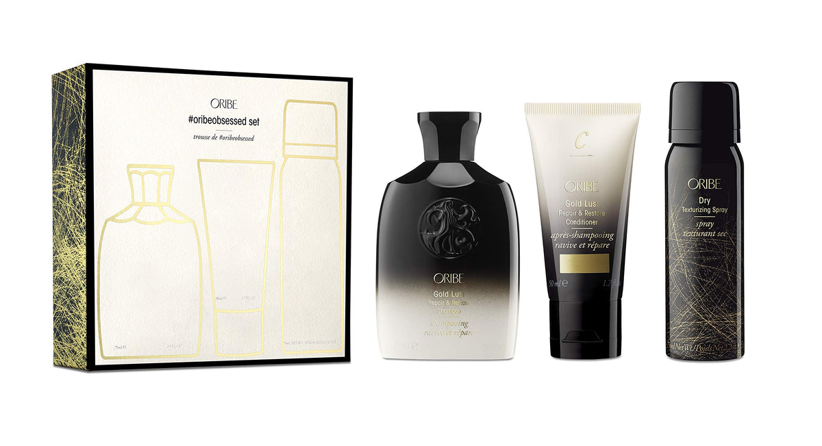 Oribe Obsessed Set front packaging shows travel trio and premium design benefit: elegant portability