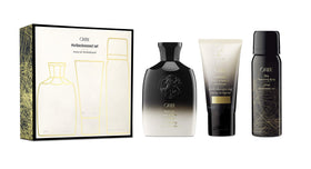 Oribe Obsessed Set front packaging shows travel trio and premium design benefit: elegant portability