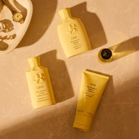 ORIBE open cap dispensing shampoo droplet for easy application