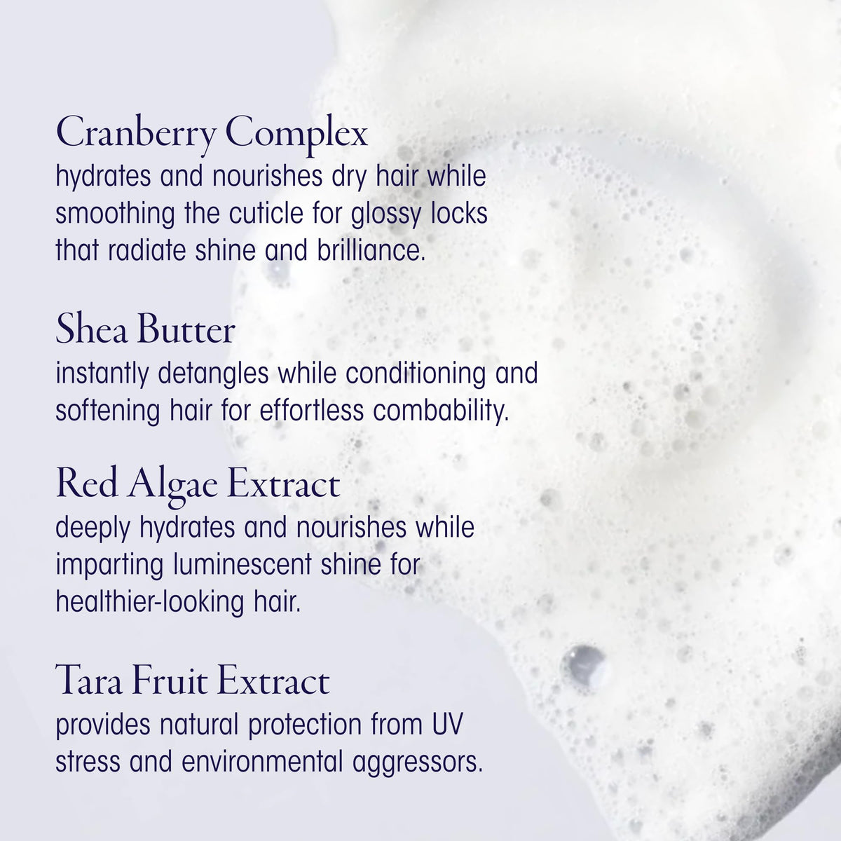 Person applying Oribe Run-Through in shower showing easier detangling and slip