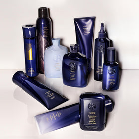 Oribe Run-Through styled in bathroom setting showing salon-quality prep and styling convenience