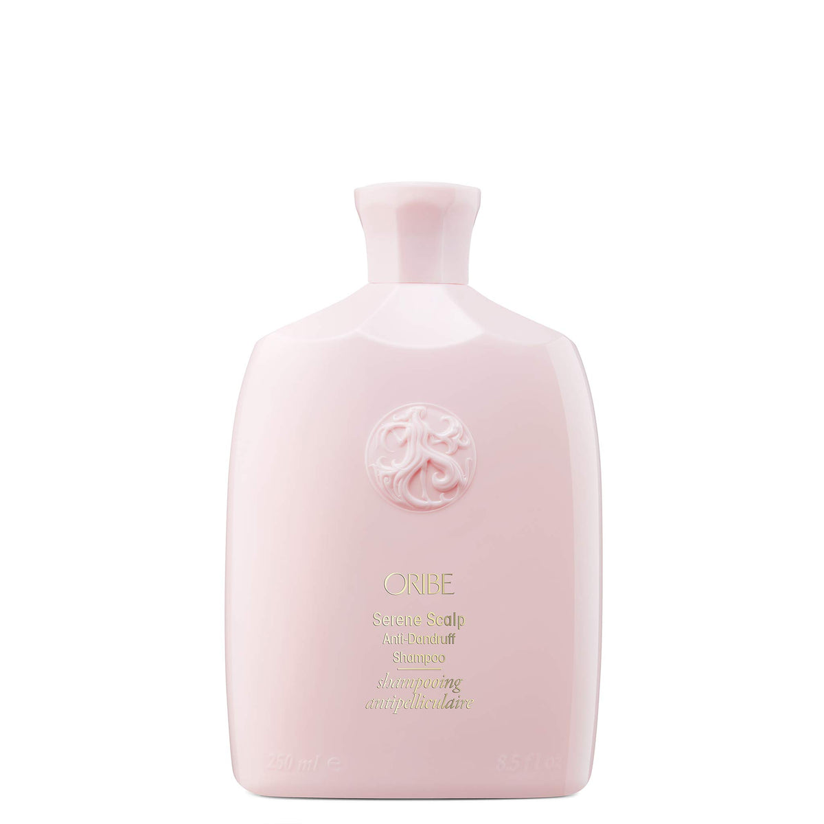 Oribe bottle front packaging showing brand and anti-dandruff benefit