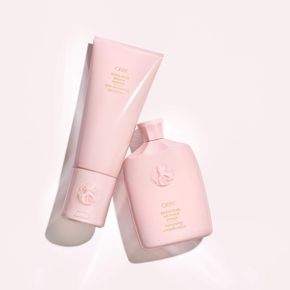 Oribe bottle staged in bathroom showing calming scalp care routine