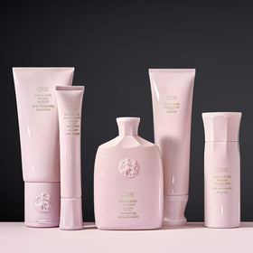 Oribe product label close-up showing ingredients and treatment benefits