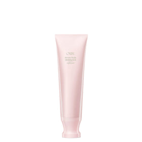 Oribe serene scalp scrub jar front view showing premium packaging and size benefit