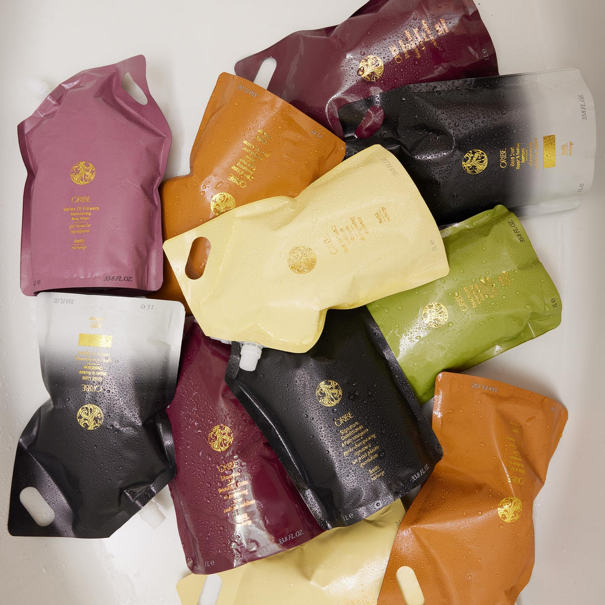 Oribe refill packaging emphasizing refill format and reduced waste