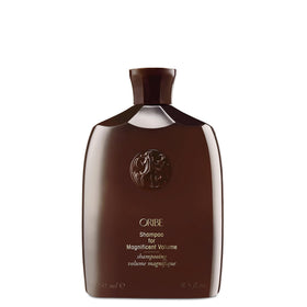 Oribe shampoo front bottle showing label and premium design for salon-quality volume