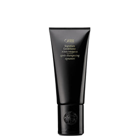 Oribe front bottle showing product branding and elegant packaging for premium appeal