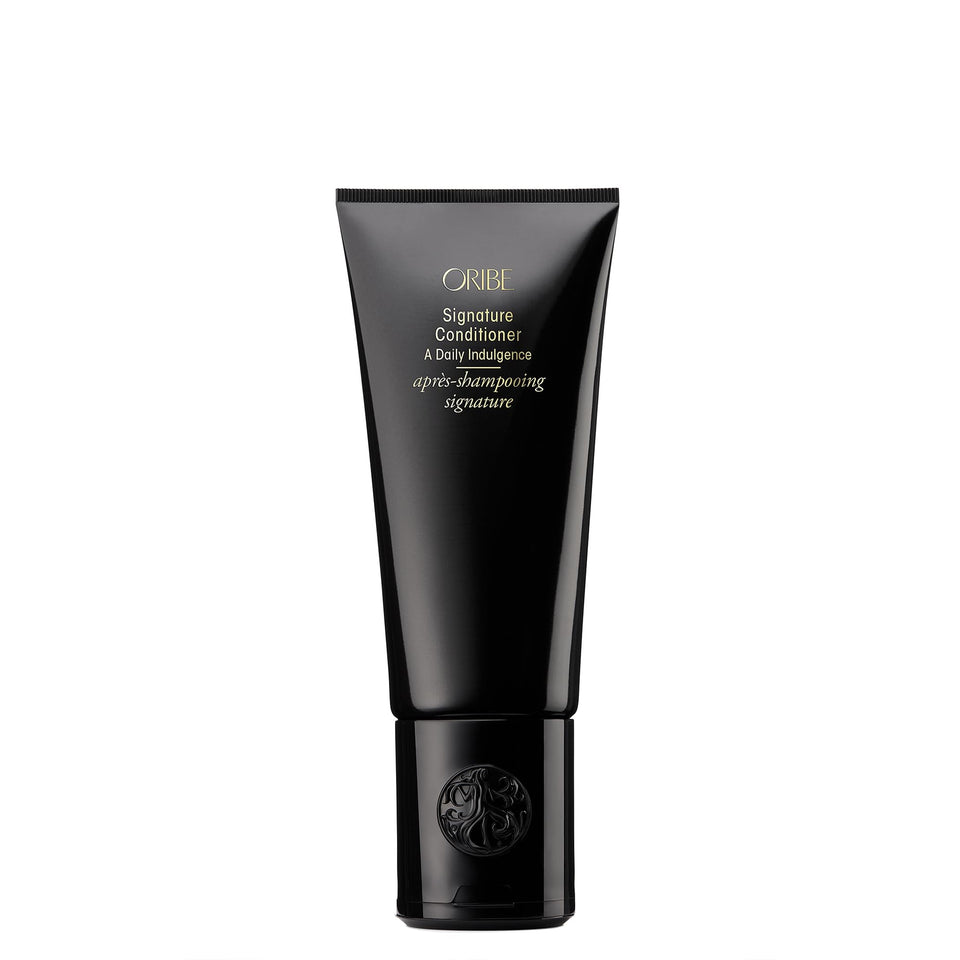 Oribe front bottle showing product branding and elegant packaging for premium appeal