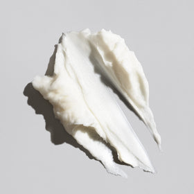 Oribe Signature Moisture Masque cream texture close-up demonstrating rich hydration