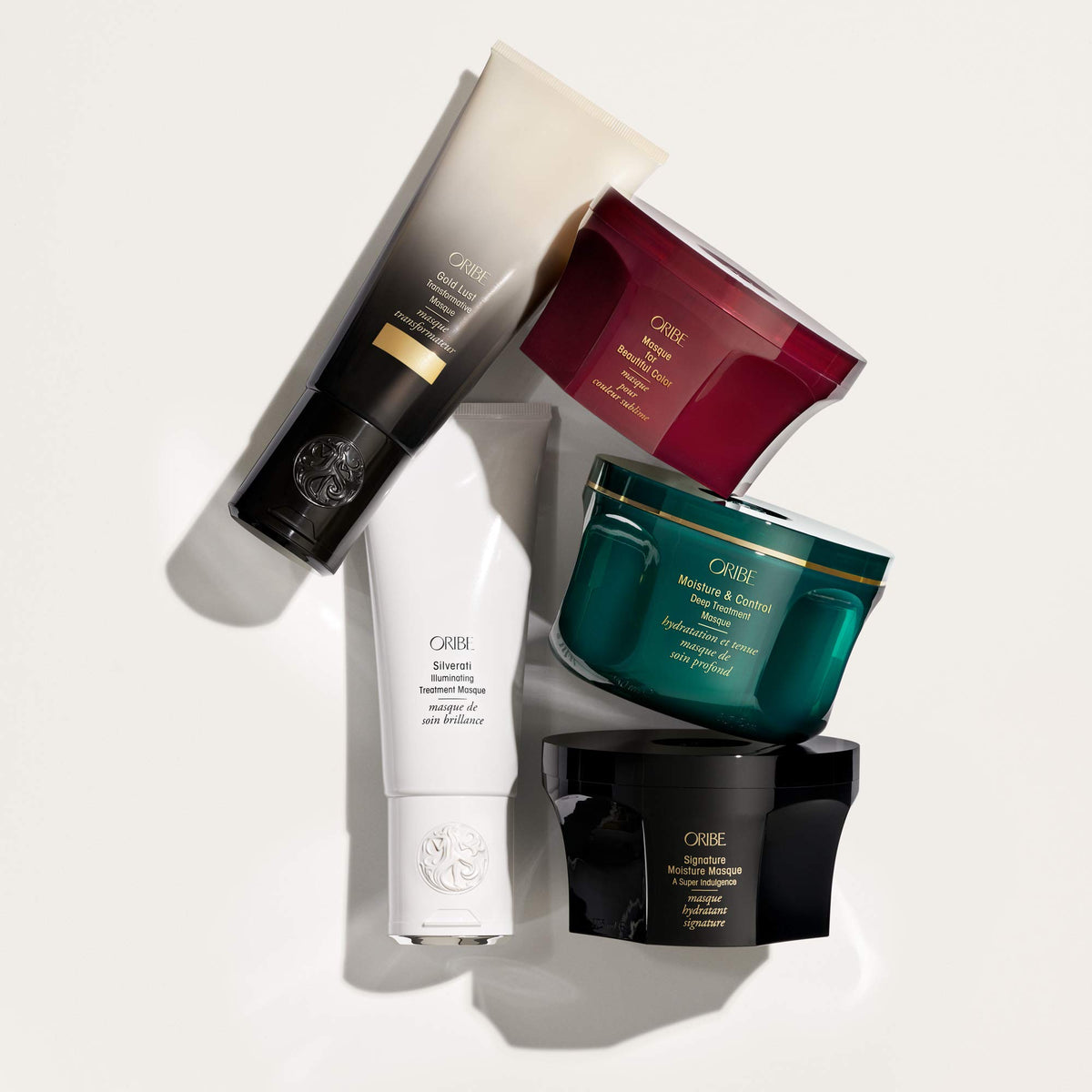 Oribe Signature Moisture Masque applied in salon setting showing improved manageability