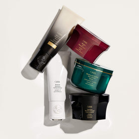 Oribe Signature Moisture Masque applied in salon setting showing improved manageability