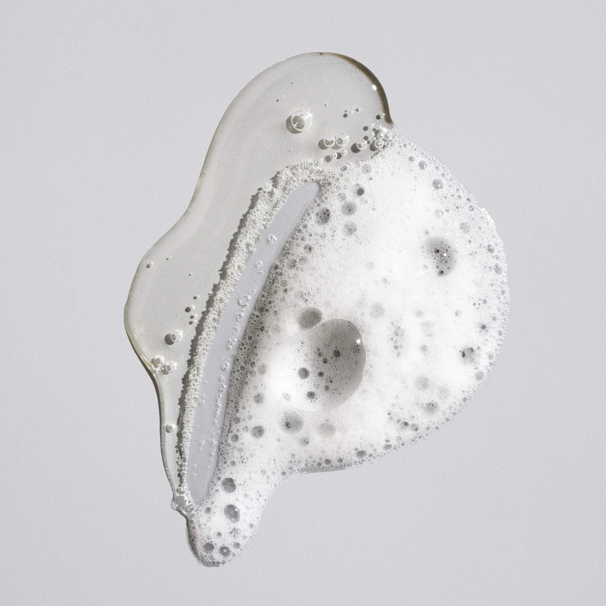 Oribe rich foam texture demonstrating creamy lather and gentle cleansing