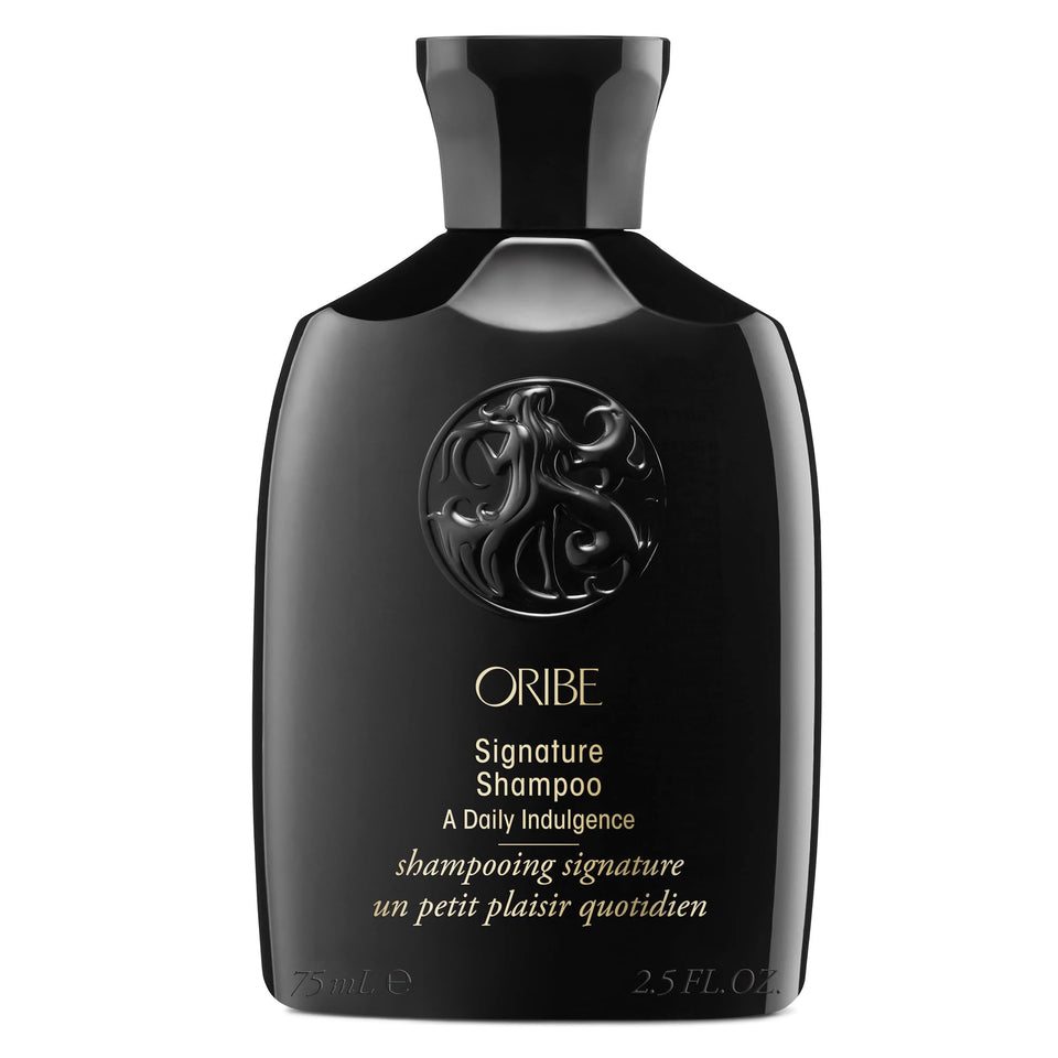 Oribe Signature Shampoo front bottle showcasing brand and elegant packaging benefit