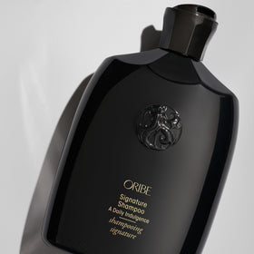 Oribe pump detail highlighting easy-dispense design and controlled dosing