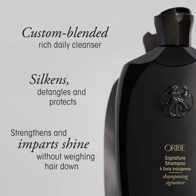 Hand pouring Oribe refill into a pump bottle for easy transfer