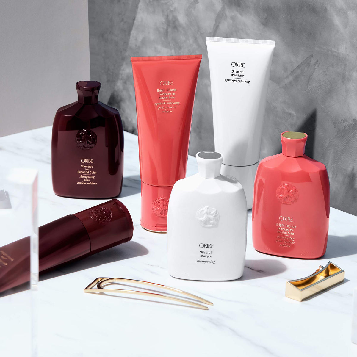 oribe bottle in hand for scale showing 6.8oz size and travel-friendly convenience