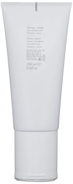 oribe creamy conditioner texture close-up showing smooth formula for easy detangling