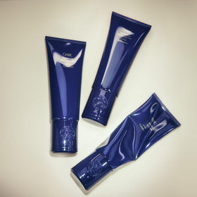 ORIBE before and after hair image showing reduced frizz and enhanced shine