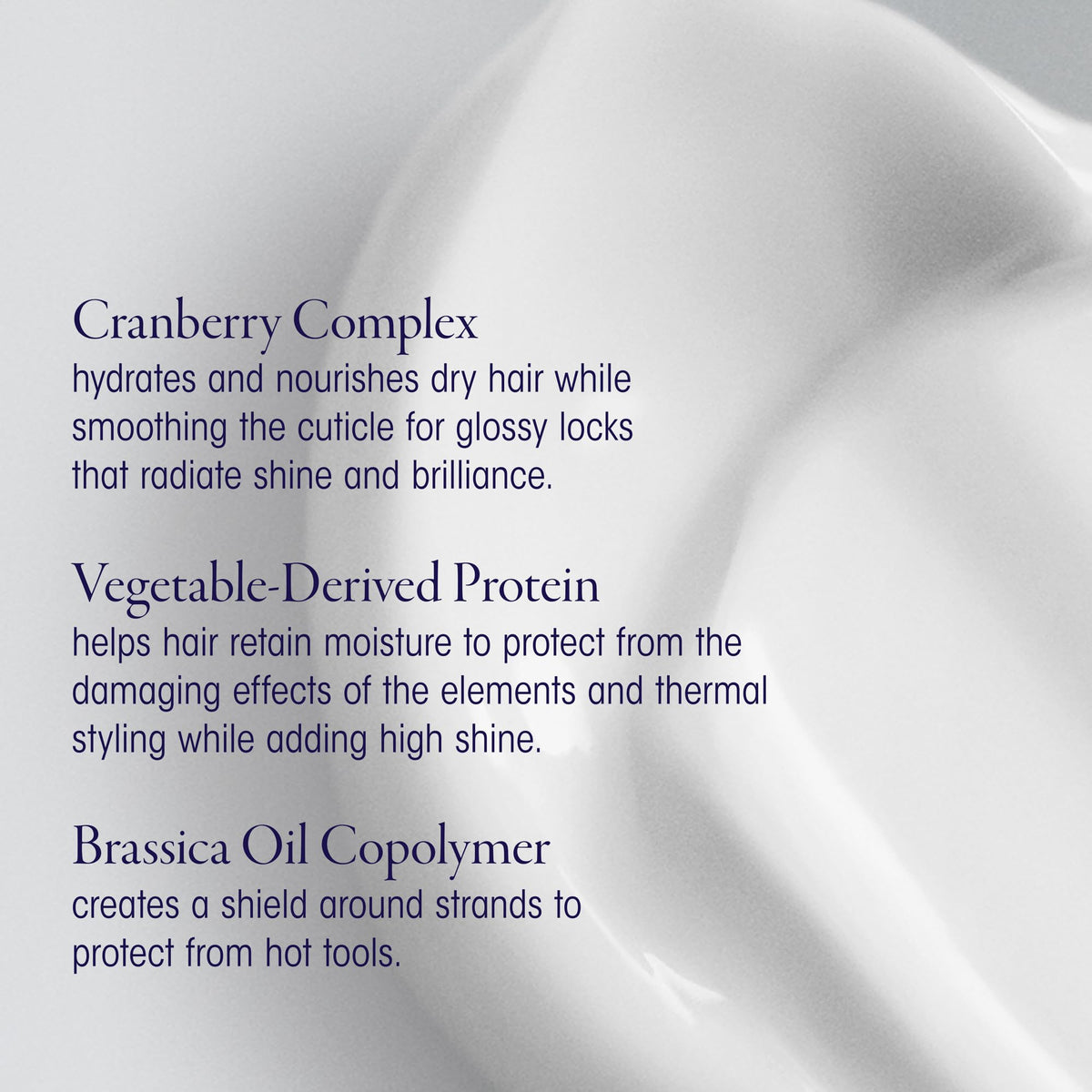 ORIBE cream on hand demonstrating slip and detangling benefit before styling