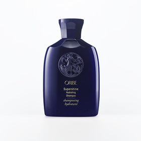 Oribe Supershine front packaging showing sleek bottle and product name for travel convenience