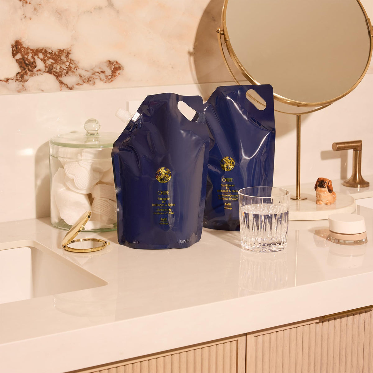 Oribe Supershine before and after hair shot showing smoother shinier results