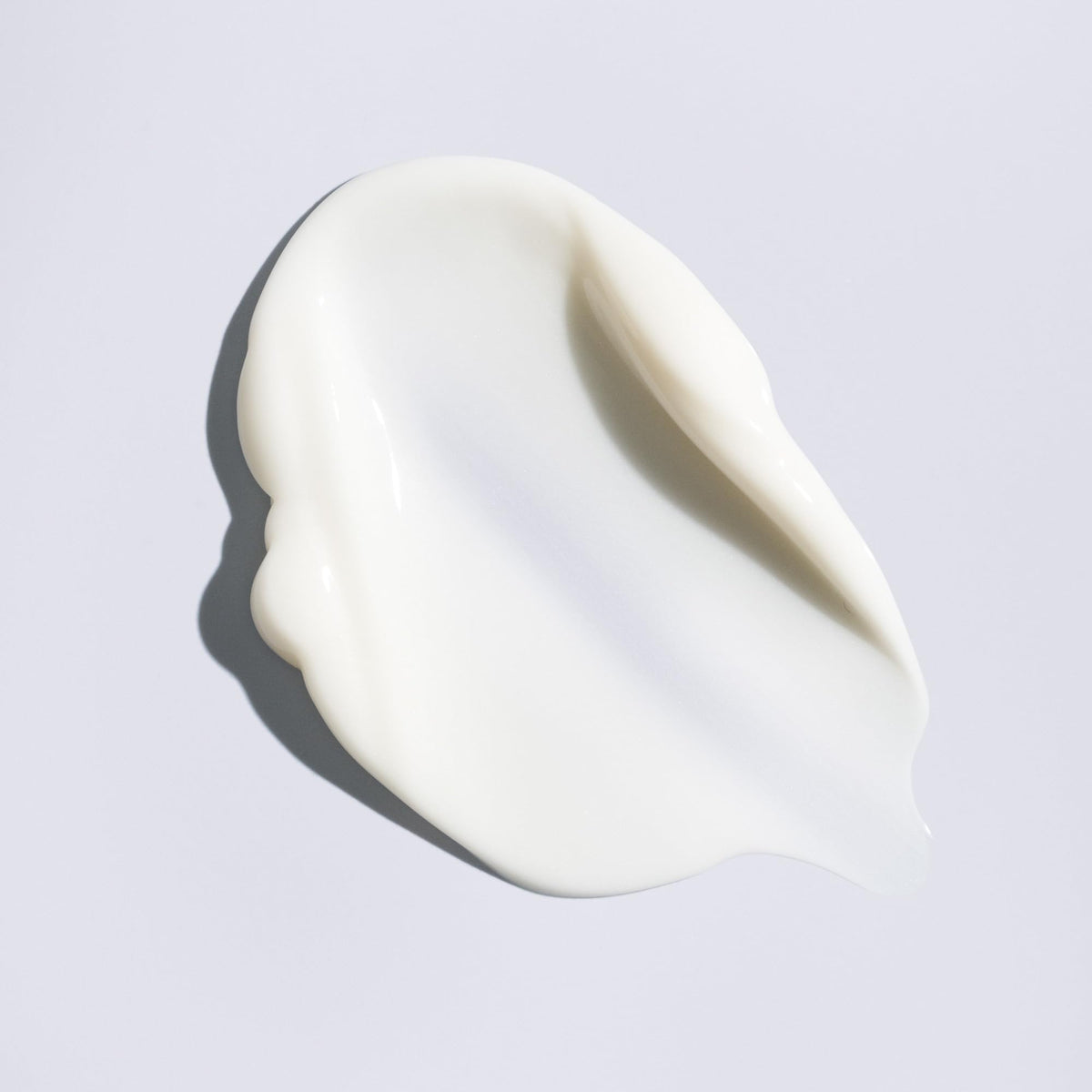 ORIBE product in bathroom styling setup suggesting salon-quality everyday use