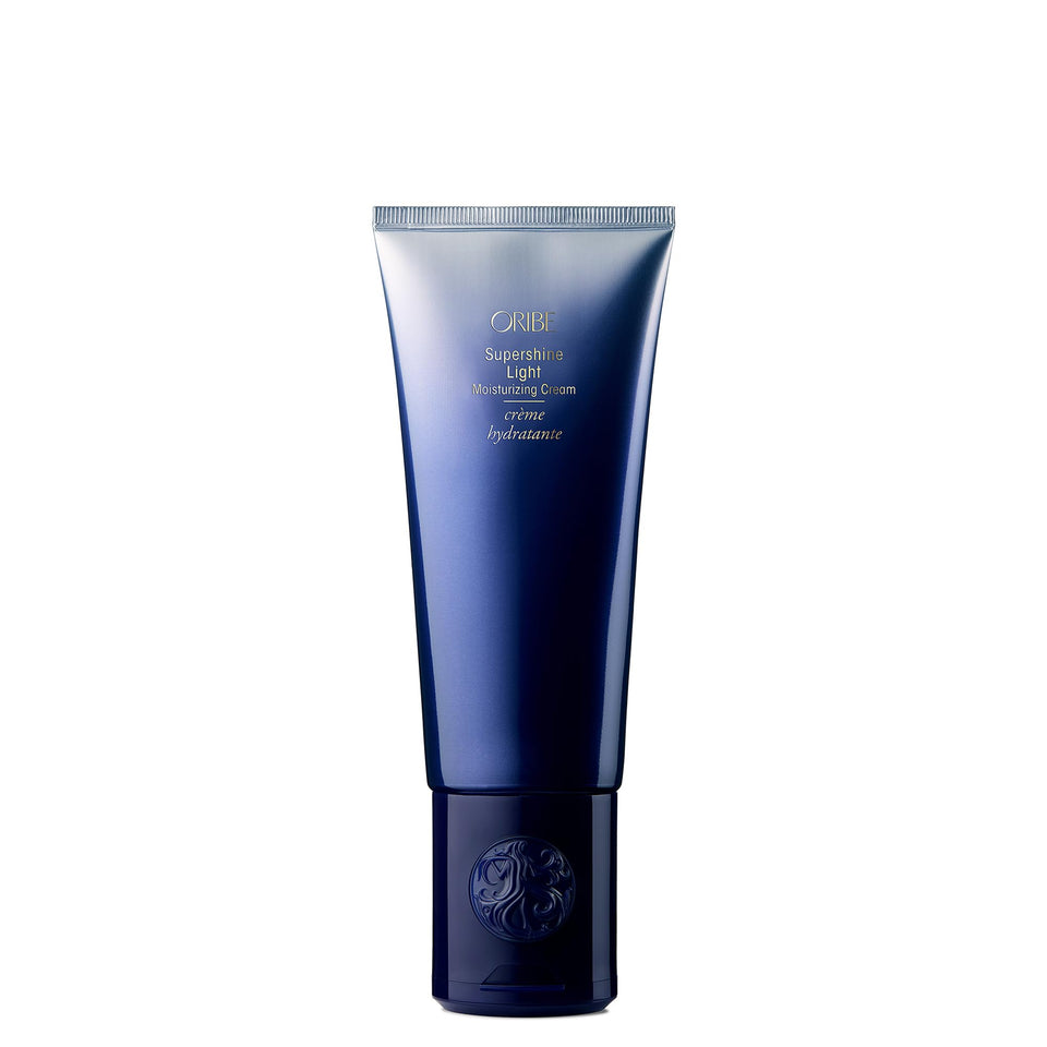 Oribe Supershine Light front packaging showing tube and brand for premium styling