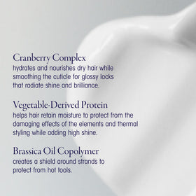 Applying Oribe Supershine Light in hand to show easy spread and control