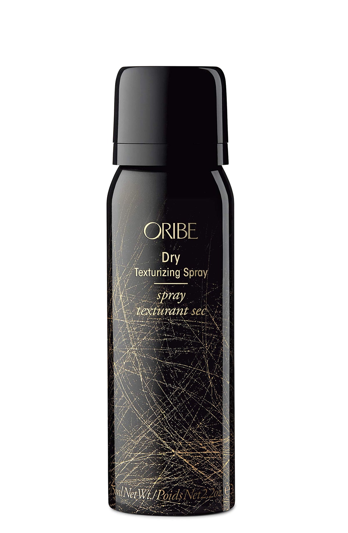 Oribe travel kit size comparison beside passport showing TSA-friendly convenience benefit