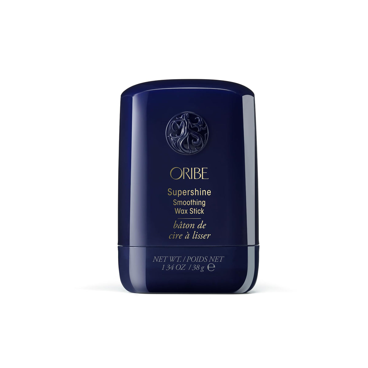 Oribe wax stick front packaging showing brand and sleek tube for quick styling