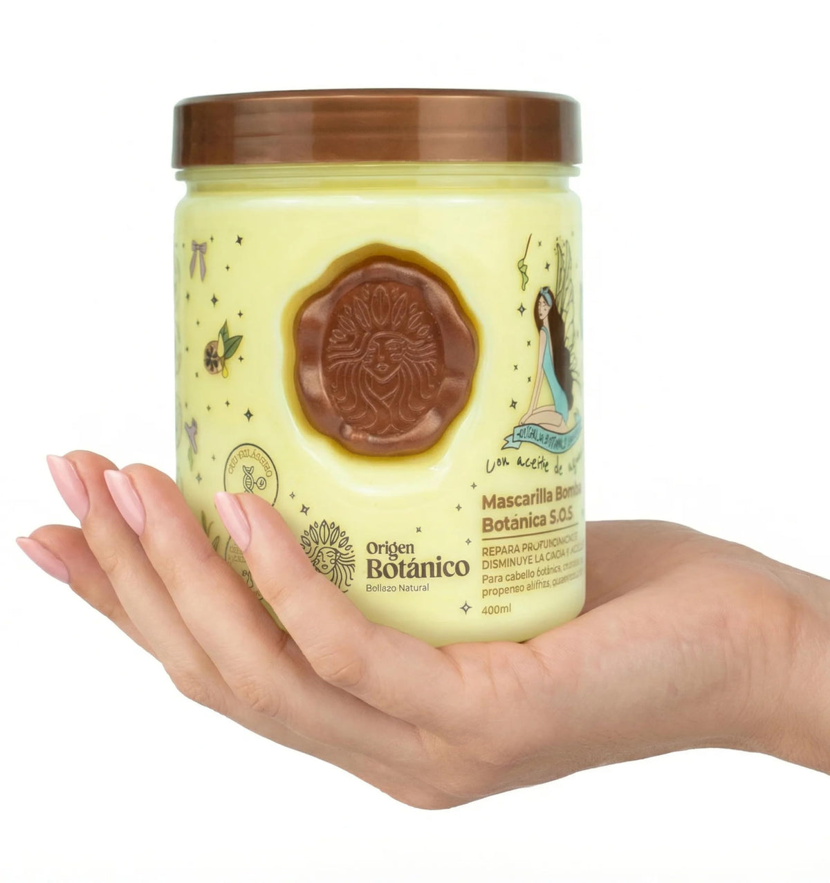 Origen Botánico applied to hair by hands demonstrating easy spread and repair