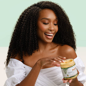 Originals by Africa's Best jar beside a ruler showing 15 oz size for clear scale and lasting use