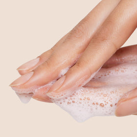Origins cream texture and light foam to show gentle lather and moisturizing benefit