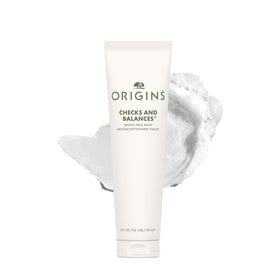 Origins front packaging showing bottle and branding, communicates clean formulation benefits