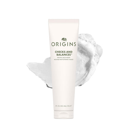 Origins front packaging showing bottle and branding, communicates clean formulation benefits