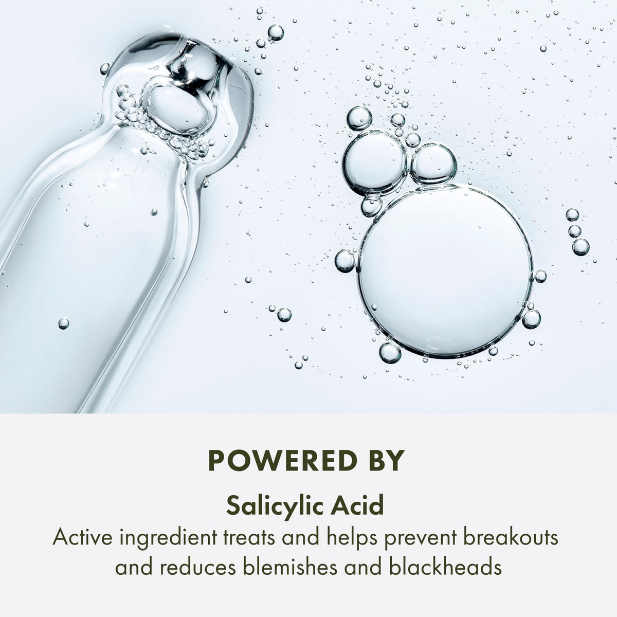 Origins ingredient label close-up, highlights salicylic and hyaluronic acids