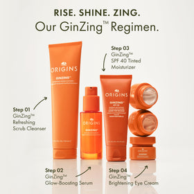 Origins GinZing applied on model cheek demonstrating natural coverage and hydrated look