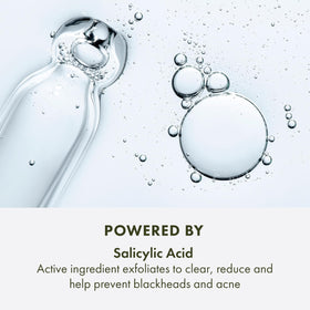 Tube label close-up listing salicylic acid and charcoal, communicates ingredient transparency