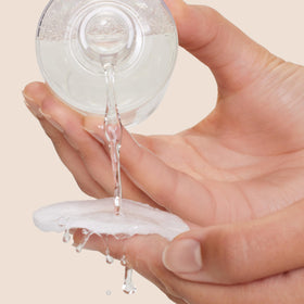 Close-up texture drop of Origins Well Off showing lightweight non-greasy benefit