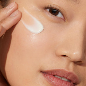 Origins Youthtopia moisturizer in hand being applied for visible plumping benefit