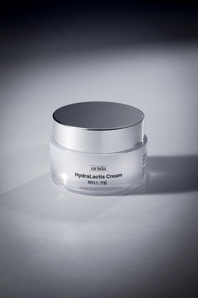 ORISIA HydraLactis cream on hand demonstrating quick absorption benefit