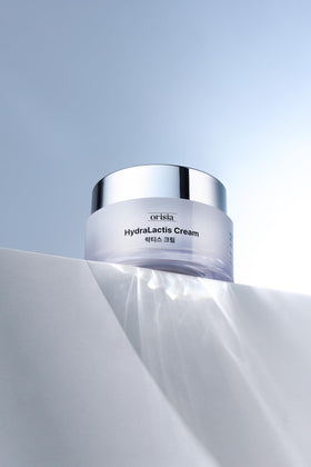 ORISIA HydraLactis applied to face in daylight showing even skin-tone benefit