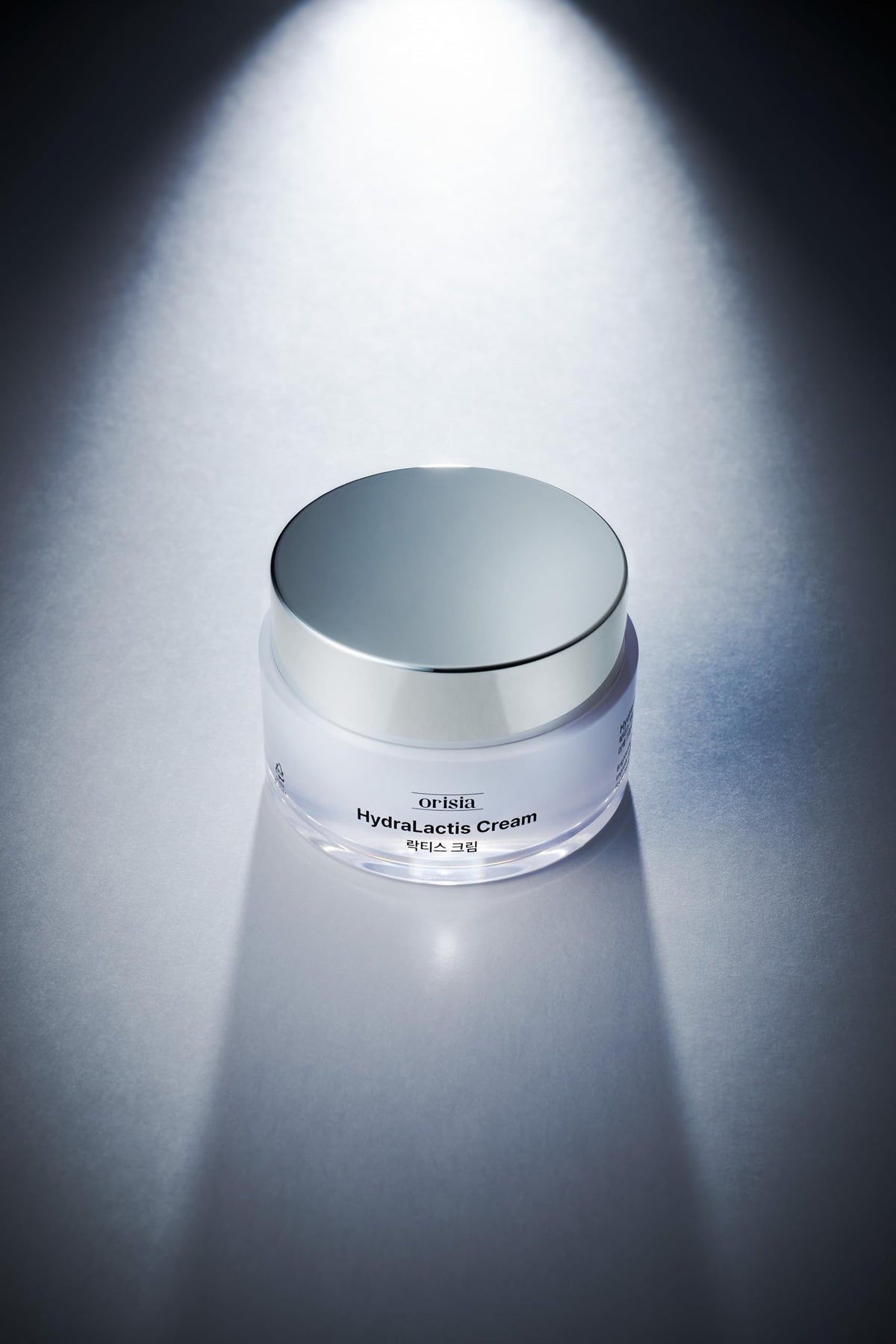ORISIA HydraLactis ingredients display highlighting niacinamide and milk protein benefits
