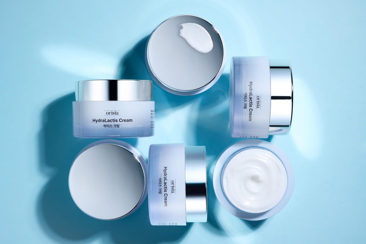 ORISIA HydraLactis on bathroom shelf in lifestyle scene showing routine-friendly benefit